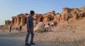 Group of tourists walking to the cliffs of Jabal Qara, Hofuf al Hasa, Saudi Arabia Royalty Free Stock Photo