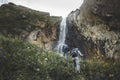 Group Of tourists Walking Uphill To Waterfall. Travel Adventure Outdoor Concept