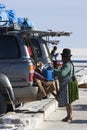 Group of tourists and 4x4 cars at the Isla Incahuasi in the Salar Uyuni