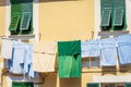Towels Hanging out to dry on a Clothesline in Liguria Italy Royalty Free Stock Photo