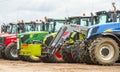 A group of tractors parked up Royalty Free Stock Photo