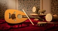 A group of traditional Middle Eastern and North African musical instruments, including a stringed oud, is artfully arranged on a Royalty Free Stock Photo