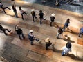 Group of traditional western folk music dancers view from above blur dynamism effect