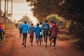 Group training in Kenya. A large group of Kenyan runners are preparing for the race. Endurance and marathon professional runners