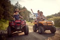 Group of traveler friends driving quads Royalty Free Stock Photo