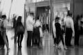 Group of traveler silhouettes in motion blur, airport inte