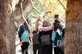 A group of travellers in winter clothes