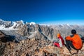 Group of trekkers climbers alpinists conquering Pik Uchitel peak from Racek Hut in Ala Archa Alpine National Park Landscape near Royalty Free Stock Photo