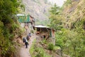 A group of trekkers heading to Lho village on Manaslu circuit with view of Mount Manaslu range 8 156 meters. Himalayas, stone Royalty Free Stock Photo