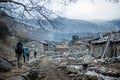 A group of trekkers heading to Samagau village on Manaslu circuit with view of Mount Manaslu range 8 156 meters. Himalayas Royalty Free Stock Photo