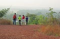 Group Trekking in Scenic Hilly Countryside