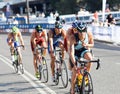 Group of triathletes cycling