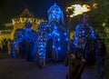 A group of tuskers parade past the Temple of the Sacred Tooth Relic in Kandy, Sri Lanka during the Esala Perahera. Royalty Free Stock Photo