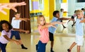 Tweens exercising in choreography class