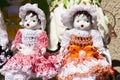 Group of white porcelain dolls with tricot dresses