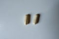 Group of two beige capsules of Saccharomyces boulardii probiotic