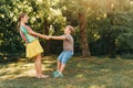 Group of two children playing together in summer park Royalty Free Stock Photo