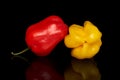 Hot chili habanero isolated on black glass