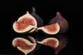 Fresh fig fruit isolated on black glass Royalty Free Stock Photo