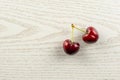 Fresh raw red sweet cherry on grey wood Royalty Free Stock Photo