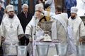 Group of Ukrainian Orthodox Church priests conducting ceremony of Great Blessing Of Water on Epiphany