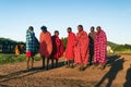 Group of unidentified African men from Masai tribe show a traditional Jump dance in a local village near Masai Mara Royalty Free Stock Photo