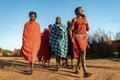 Group of unidentified African men from Masai tribe show a traditional Jump dance in a local village near Masai Mara Royalty Free Stock Photo