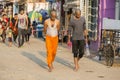 A Group of unidentified Sadhus pilgrims dressed in orange clothes. It is a mass Hindu pilgrimage of faith and bathe in the sacred