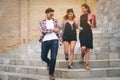 Group of university students walking in university Royalty Free Stock Photo