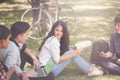 Group of university students working outside together in campus, Happy Diverse students team concept. Royalty Free Stock Photo