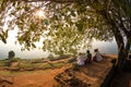 Group of unrecognizable tourists enjoying amazing view from mount Sigiriya, Sri Lanka, Ceylon. Sigiriya, Lion rock, is a