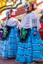 Group of unrecognizable women wearing traditional sugar skull ma