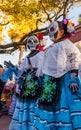 Group of unrecognizable women wearing traditional sugar skull ma