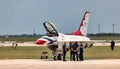 Group of USAF Thunderbirds pilots after flight, next to F-16C Fighting Falcon plane. Royalty Free Stock Photo