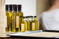 Various bottles of Greek Olive Oil in a traditional tavern in Greece