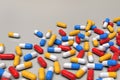 Colorful medicine capsules on light background, horizontal