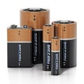 Group of various sized batteries isolated on white background. 3D illustration