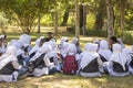 Muslim girls from some local school enjoy a meeting with their history teacher close to the Borobudur temple