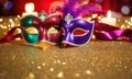 A group of Venetian or Mardi Gras masks on a dark, glittery surface with a bokeh light effect in the background.