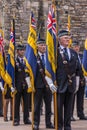 Group of veterans with flags at Scottish National War Memorial a