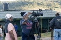 Group of video operators setting up equipment