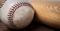 Vintage baseball gear on a wooden background