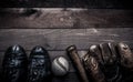 Vintage baseball gear on a wooden background