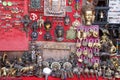 Group of vintage handmade decorative items of different material like brass, copper & other looked at buddha temple surrounding in