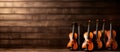 group of violins on a wooden background