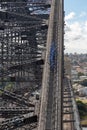 Group of visitors climbing at the top of the Sydney Harbour Bridge