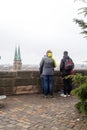 Group of visitors enjoying the aerial view of the Bavarian city of Nuremberg, Germany