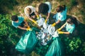 Group of volunteers childrens collected trash in city park, generative AI
