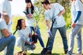 Group of volunteers planting tree in park Royalty Free Stock Photo