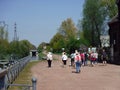 Group of walkers along the banks of a canal.